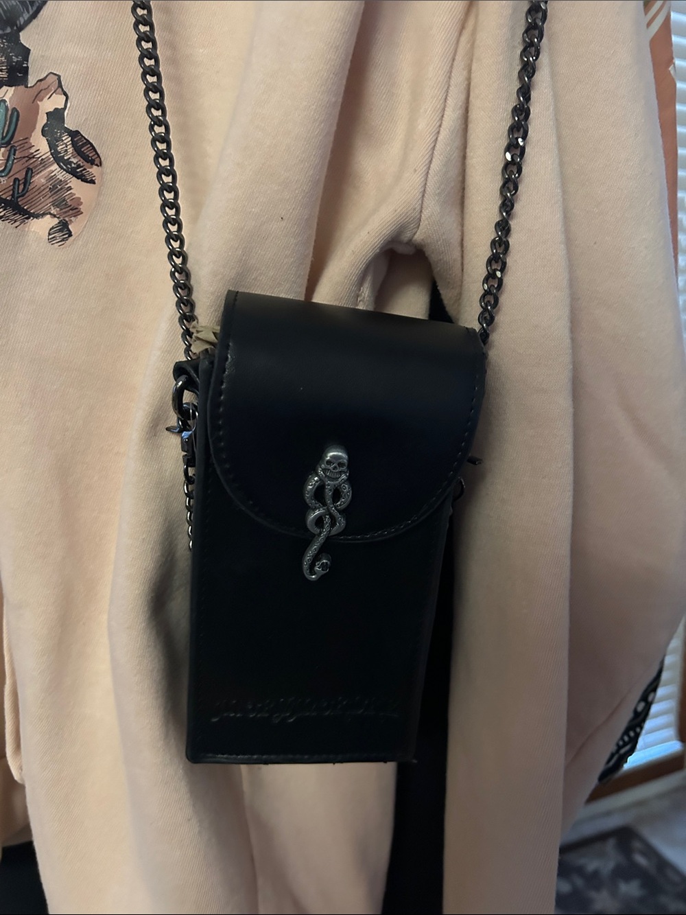 Black Crossbody Phone Bag with Silver Snake Skull Accent VGUC